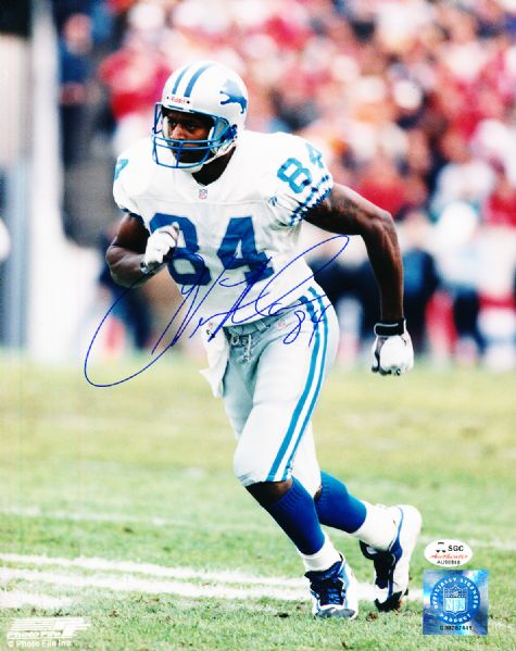 Herman Moore Autographed Detroit Lions Ftbl. Color 8” x 10” Photo- SGC Authenticated