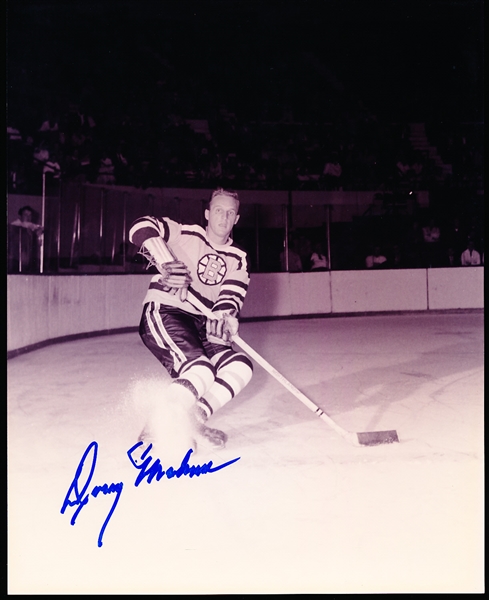 Autographed Doug Mohns Boston Bruins NHL B/W 8” x 10” Game Action Photo