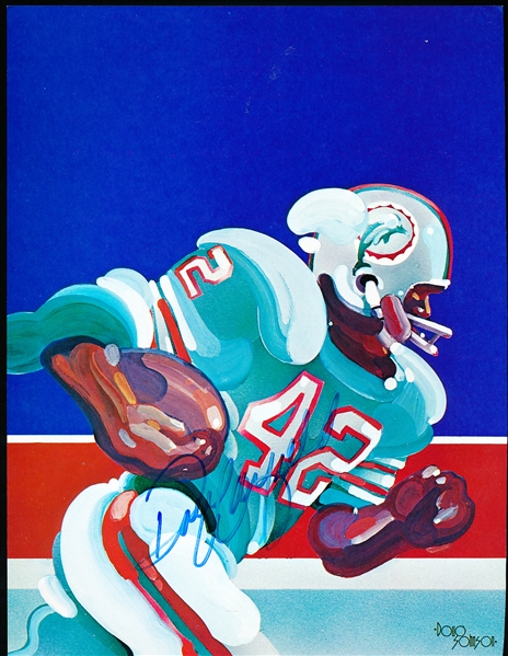 Autographed Paul Warfield Miami Dolphins NFL Color 8 ¼” x 10 ¾” Page from Book