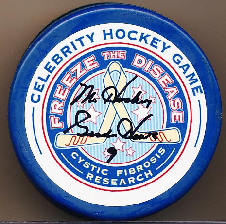 Autographed Gordie Howe In Glas Co. “Freeze the Disease” Celebrity Hockey Game Puck- JSA Certified