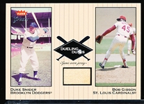 2002 Greats of the Game Bb- “Dueling Duos Game Used Single”- #DD-BG1 Duke Snider (B. Dodgers)/ Bob Gibson Jersey (Cardinals)