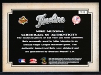 2005 Diamond Kings Bb- “Timeline Dual Materials”- #T-13 Mike Mussina, Orioles/ Yankees- #18/100