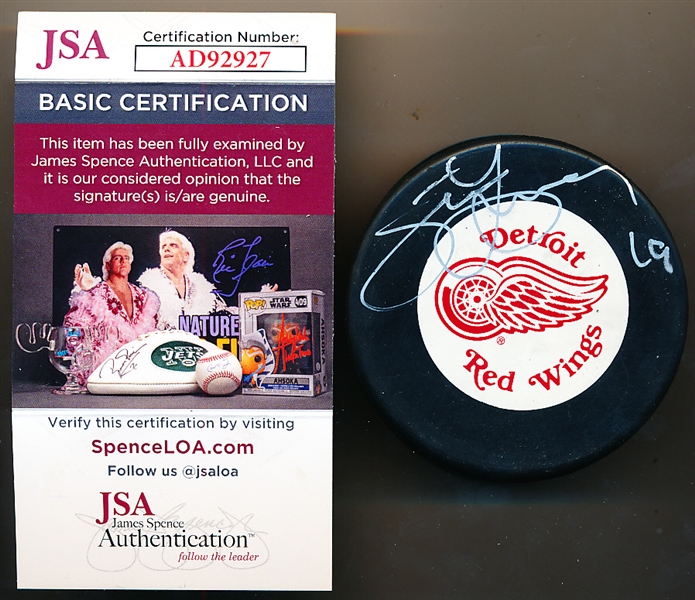 Autographed Steve Yzerman Trench Red Wings Logo Puck- JSA Certified