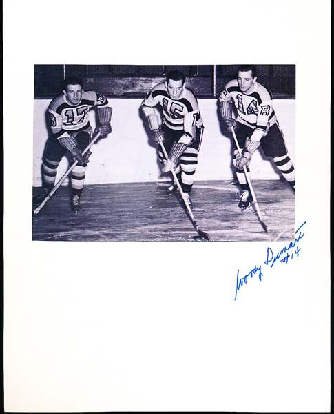 Autographed Woody Dumart Boston Bruins NHL 8” x 10” Backer Board with a 4-¼” x 6-3/8” B/W Photo attached