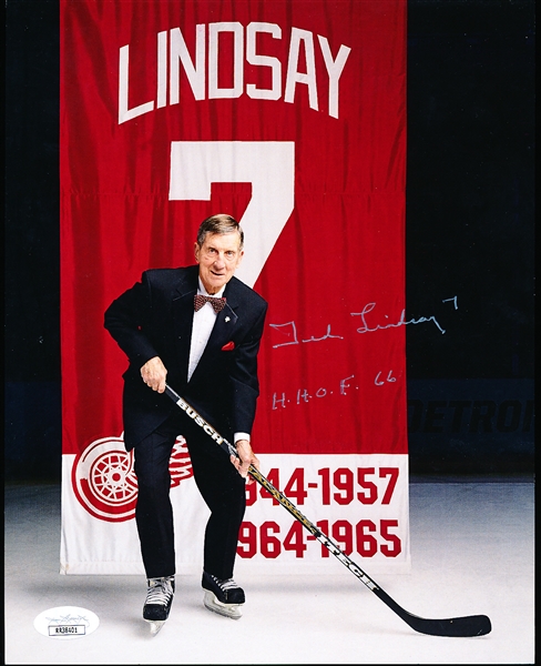 Autographed Ted Lindsay Detroit Red Wings NHL Color 8” x 10” Photo in front of His Rafters Banner- JSA Certified