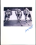 Autographed Woody Dumart Boston Bruins NHL 8” x 10” Backer Board with a 4-¼” x 6-3/8” B/W Photo attached