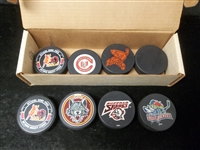 Hockey Logo Puck Lot- 7 Pucks
